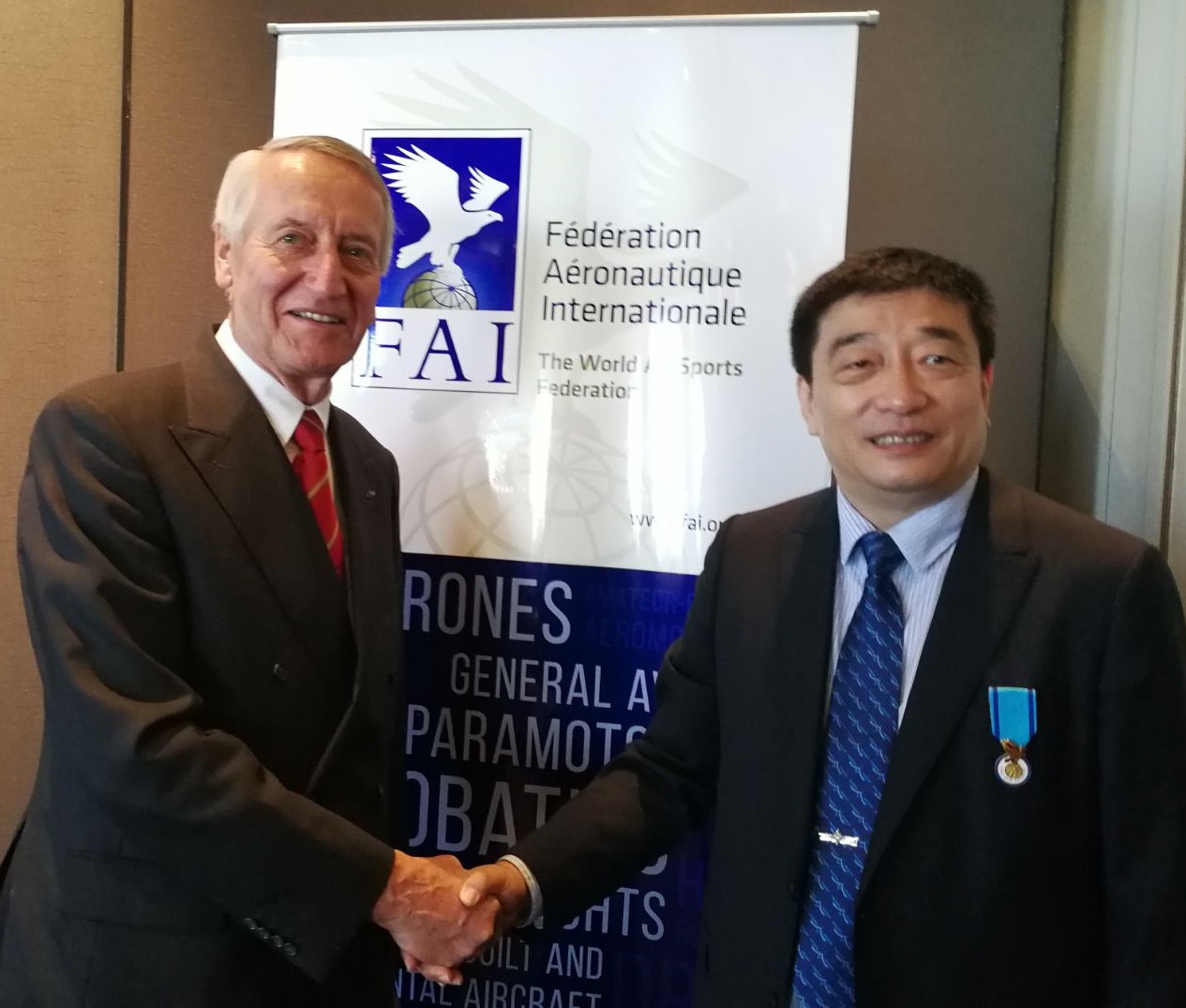 FAI President with Mr Zhao Yong, Deputy Minister of General Administration of Sports of China. FAI President with Mr Zhao Yong, Deputy Minister of General Administration of Sports of China.